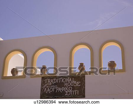 Picture - Wall of urns in Rhodes Greece. Fotosearch