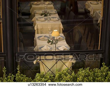 Window overlooking interior or restaurant in Rome View Large Photo Image Picture - Window overlooking interior or restaurant in Rome. Fotosearch