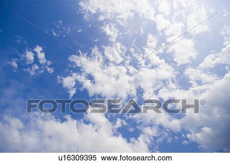 Stock Photography - A Blue Sky and Clouds. Fotosearch
