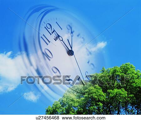 Stock Photo - A clock and the sky. Fotosearch