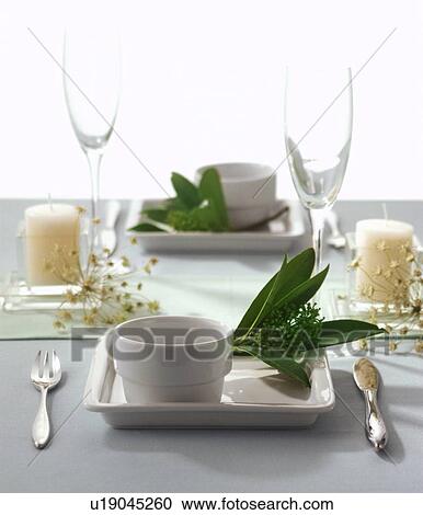 Stock Image - A contemporary table setting for two. Fotosearch