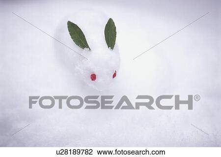 Stock Image - A Rabbit made from Snow. Fotosearch