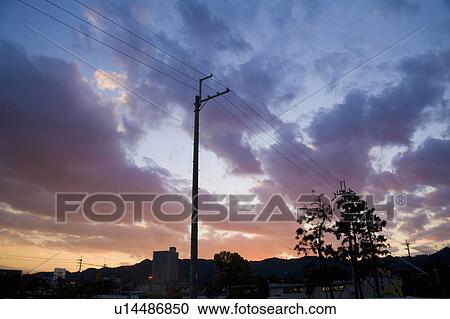 Stock Image - A Town at Sunset. Fotosearch