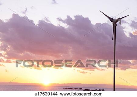 Picture - A Wind Turbine at Sunset. Fotosearch
