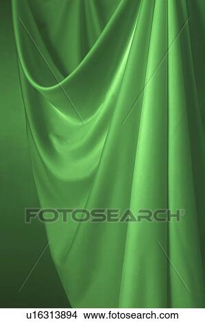 An elegantly-draped cloth hanging View Large Photo Image Picture - An elegantly-draped cloth hanging. Fotosearch