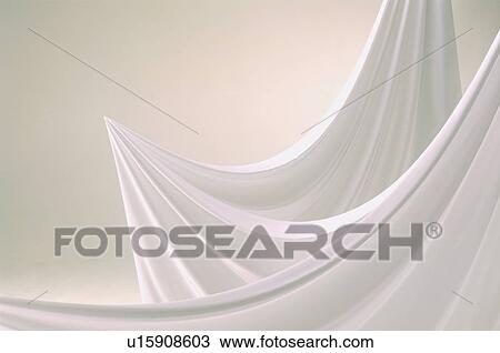 Stock Image - An elegantly-draped cloth hanging. Fotosearch
