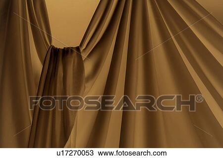 An elegantly-draped cloth hanging View Large Photo Image Stock Image - An elegantly-draped cloth hanging. Fotosearch