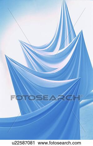 Stock Image - An elegantly-draped cloth hanging. Fotosearch