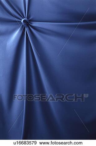 Stock Photo - An elegantly-draped cloth hanging. Fotosearch
