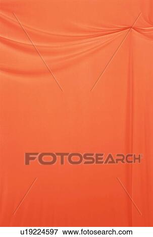 Stock Photo - An elegantly-draped cloth hanging. Fotosearch