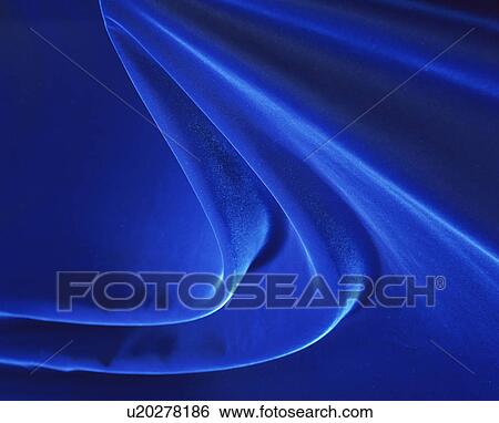 An elegantly-draped cloth hanging View Large Photo Image Stock Photograph - An elegantly-draped cloth hanging. Fotosearch