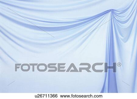 Stock Photograph - An elegantly-draped cloth hanging. Fotosearch