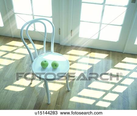 Stock Image - Apples on chair, computer graphic. Fotosearch