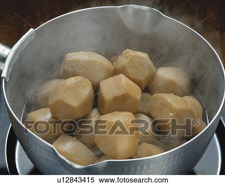 Stock Photography - Aroid cooked in pan. Fotosearch
