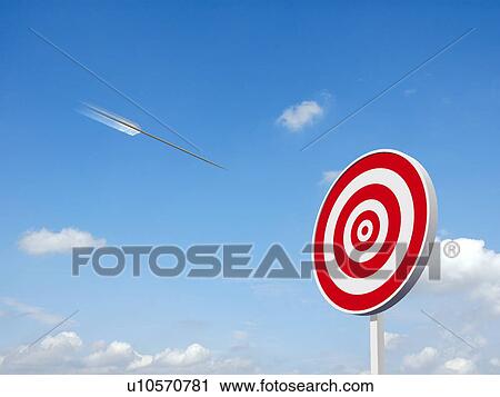 Arrow approaching the bull's eye with sky in the background View Large Photo Image Stock Image - Arrow approaching the bull's eye with sky in the background. Fotosearch