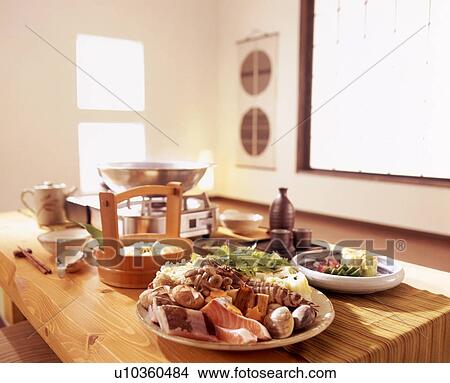 Picture - Assortment of meats and vegetables on table. Fotosearch
