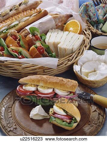 Stock Image - Assortment of sandwiches and cheese. Fotosearch
