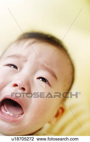 Baby crying with mouth open View Large Photo Image Stock Image - Baby crying with mouth open. Fotosearch