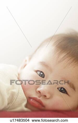 Baby looking at camera View Large Photo Image Picture - Baby looking at camera. Fotosearch
