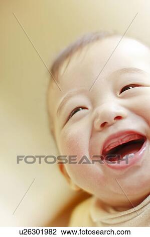 Stock Image - Baby smiling. Fotosearch