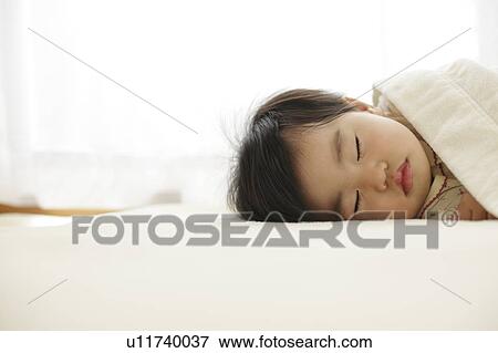 Stock Photo - Baby taking a nap. Fotosearch