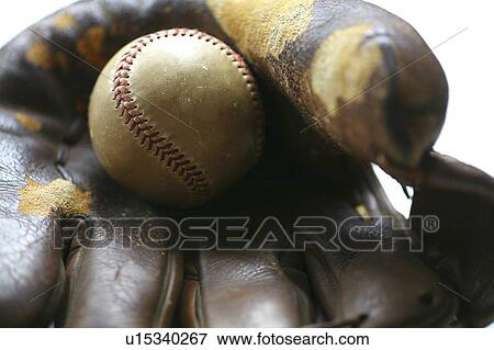 Stock Photo - Baseball in glove. Fotosearch