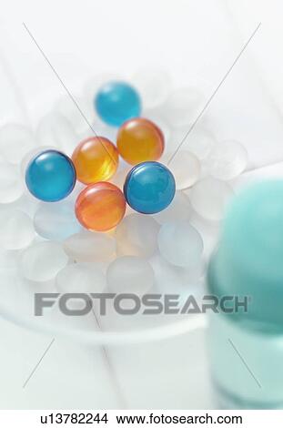 Bath beads on soap dish, close up View Large Photo Image Picture - Bath beads on soap dish, close up. Fotosearch