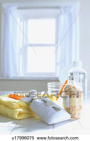 Bathroom products on tiles near window View Large Photo Image Stock Photography - Bathroom products on tiles near window. Fotosearch