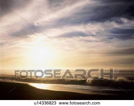 Beach in sunset View Large Photo Image Stock Image - Beach in sunset. Fotosearch