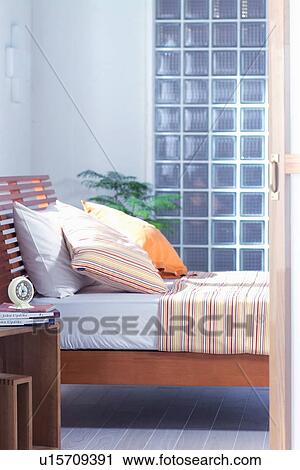 Bed seen through doorway View Large Photo Image Stock Image - Bed seen through doorway. Fotosearch