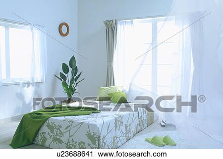 Stock Image - Bedroom with light breeze. Fotosearch
