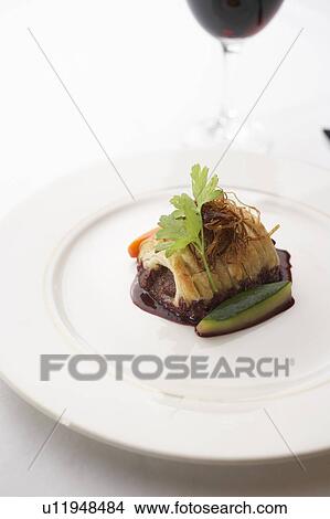 Beef sausage roll with sauce View Large Photo Image Picture - Beef sausage roll with sauce. Fotosearch