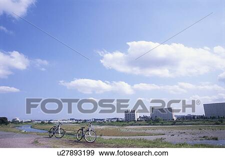 Bicycles next to Tama River, Tokyo, Japan View Large Photo Image Stock Photo - Bicycles next to Tama River, Tokyo, Japan. Fotosearch