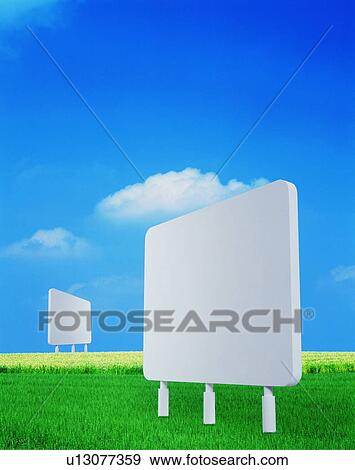 Blank signposts in a green field View Large Photo Image Stock Photo - Blank signposts in a green field. Fotosearch
