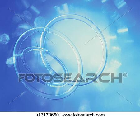 Blue rings in blue light View Large Photo Image Stock Image - Blue rings in blue light. Fotosearch