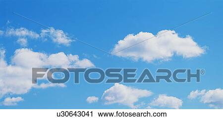 Blue sky and clouds View Large Photo Image Stock Image - Blue sky and clouds. Fotosearch