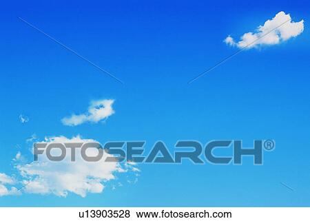 Blue sky and clouds View Large Photo Image Stock Photo - Blue sky and clouds. Fotosearch