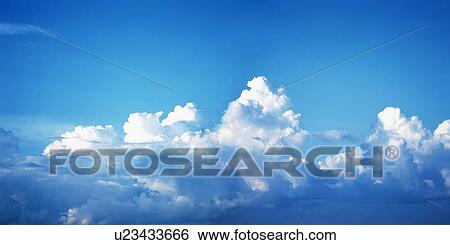 Blue sky and clouds View Large Photo Image Stock Photograph - Blue sky and clouds. Fotosearch