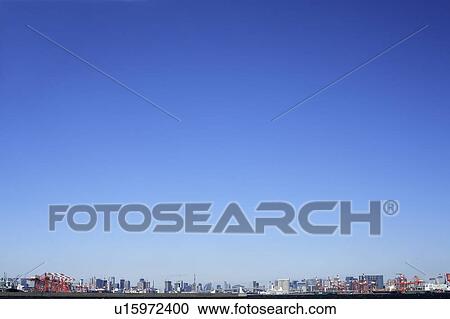 Blue sky over office buildings, copy space, Tokyo prefecture, Japan View Large Photo Image Stock Image - Blue sky over office buildings, copy space, Tokyo prefecture, Japan. Fotosearch