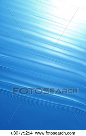 Picture - Blue water surface. Fotosearch