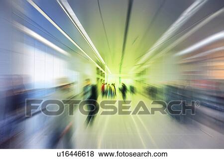Stock Photo - Blurred Image of People Walking Through a Station. Nagoya, Aichi Prefecture, Japan. Fotosearch