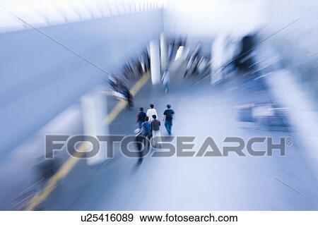 Stock Photo - Blurred Image of People Walking Through a Station. Nagoya, Aichi Prefecture, Japan. Fotosearch