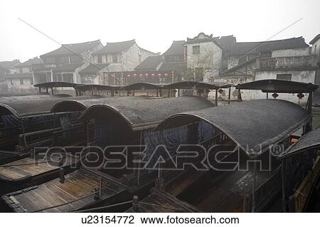 Stock Image - Boats on river, China. Fotosearch