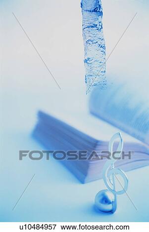 Book and music note ornament View Large Photo Image Stock Photo - Book and music note ornament. Fotosearch