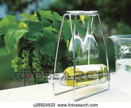 Stock Image - Bottle of wine and wineglasses. Fotosearch