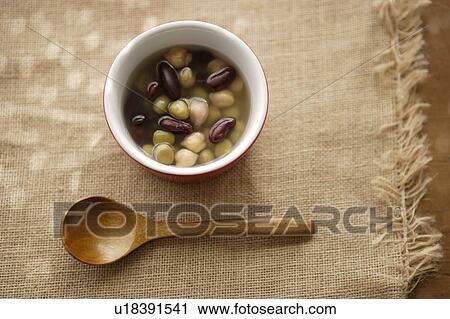 Bowl of bean soup and wooden spoon View Large Photo Image Stock Image - Bowl of bean soup and wooden spoon. Fotosearch