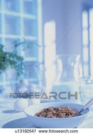 Bowl of breakfast cereal with milk and eggs View Large Photo Image Stock Photo - Bowl of breakfast cereal with milk and eggs. Fotosearch