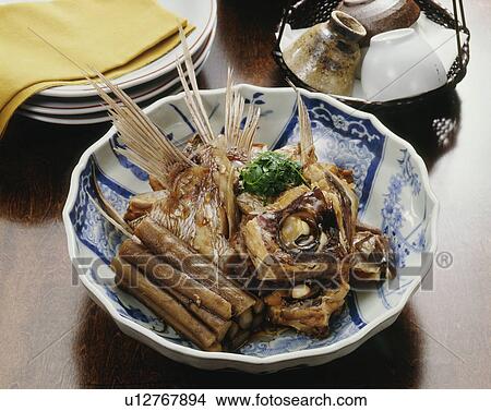 Picture - Bowl of cooked sea bream. Fotosearch