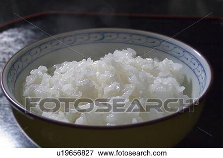 Bowl of rice, close up View Large Photo Image Stock Photo - Bowl of rice, close up. Fotosearch