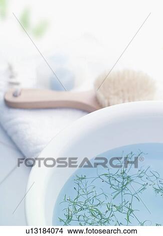 Bowl with herbs and toiletries on towel View Large Photo Image Picture - Bowl with herbs and toiletries on towel. Fotosearch